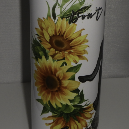 A decorative item featuring vibrant sunflowers and green leaves.