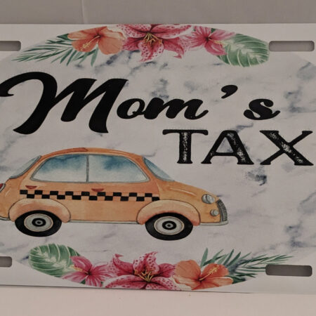 A decorative sign reading 'Mom's TAX' with a car and floral accents.